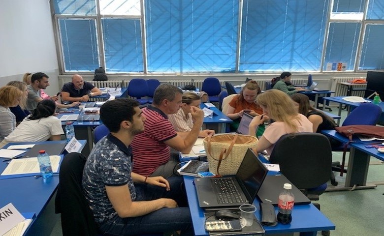 Participants are working on a group project